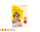 Buchcover: "Umgang mit „schwierigen“ Kindern" in der Grundschule. Ein Junge schaut grimmig.